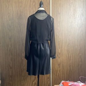 Black satin sleeveless dress with sheer black button and tie front wrap